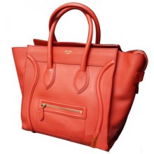 思琳2011新款橘红色双手提笑脸包Luggage Mini女士中号手袋